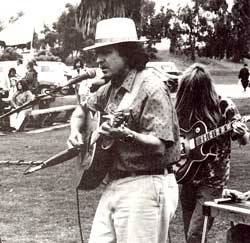 Country Joe McDonald, a longtime friend of aquatic mammals, left the Fish in San Francisco to sing praises for whales in San Diego.